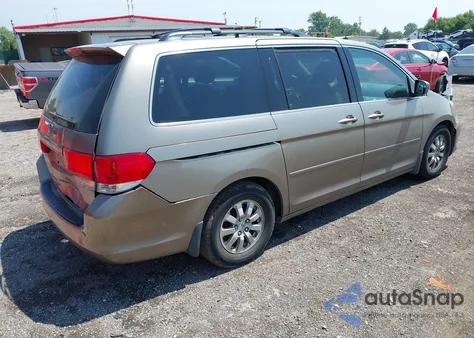 2010 Honda Odyssey Ex z USA, uszkodzony, nr VIN 5FNRL3H59AB019293